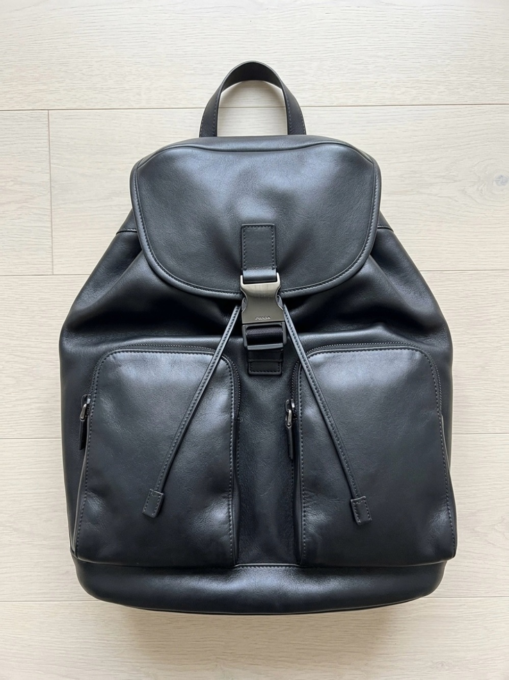 Prada Black Leather Drawstring Backpack with Front Pockets